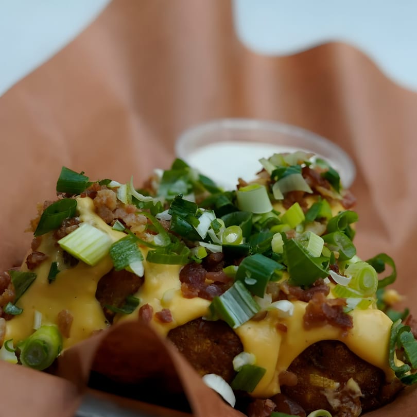 GB's Pub & Grub's loaded tater tots with melted cheese, bacon bits, and green onions.